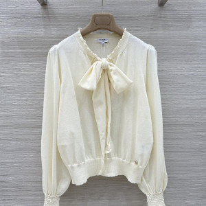 코코 나비매듭 실크 니트 상의